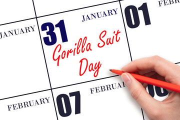 January 31. Hand writing text Gorilla Suit Day on calendar date. Save the date.