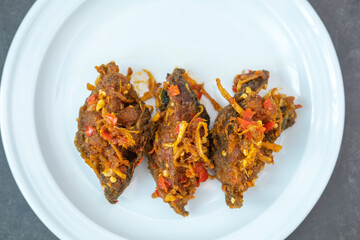 Traditional Thai spicy stir-fried catfish with curry paste Southern food, traditional recipe