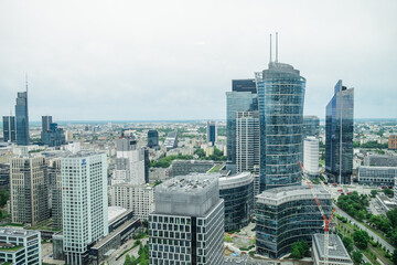 Aerial view of Warsaw's iconic high-rise buildings. - obrazy, fototapety, plakaty