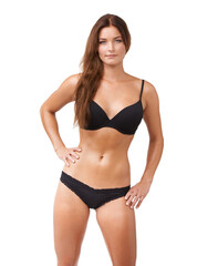 Fototapeta premium Woman, portrait and lingerie confidence in studio or natural beauty, empowerment pose or isolated white background. Female person, model and face in underwear bra or self care, fit or body positivity