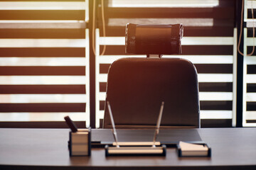 Business office workplace. Sunlight at work place for chief, boss or other employees. Table and...