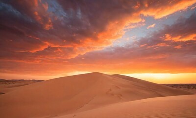 Fototapeta na wymiar A Sunset Over A Desert With Sand Dunes And A Cloudy Sky