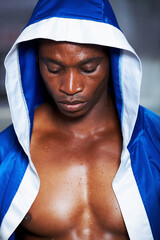 Black man, boxing champion and robe getting ready for fight, challenge or sports competition at...