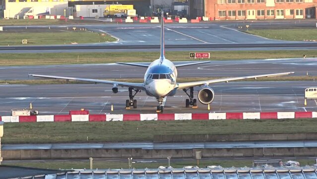 Stored Parked Grounded Aircraft airplane with one engine missing due to Coronavirus Covid19 Covid at International Airport.