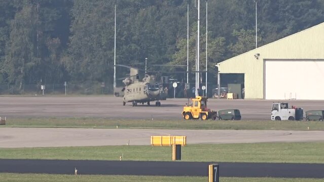 Army Military Helicopter Taxiing at Air Base prior to a mission
