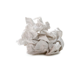Single screwed or crumpled tissue paper or napkin in strange shape after use in toilet or restroom isolated with clipping path and shadow in png file format