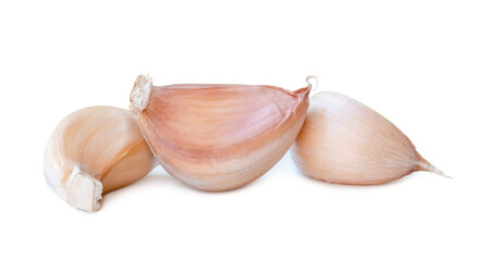 Fresh unpeeled garlice cloves in stack isolated with clipping path and shadow in png file format