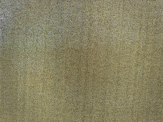 Close-up of a light beige green textured fabric with a subtle pattern of vertical lines, conveying a natural and organic feel