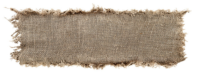 Burlap texture. A piece of torn burlap on a white background. Canvas. Packing material - obrazy, fototapety, plakaty