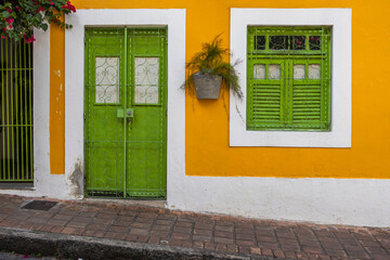 Facades with colorful houses fill the urban scene with traditional architecture in the historic...