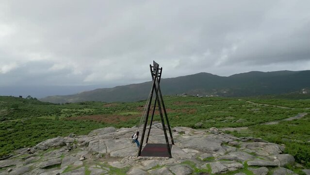 Aerial footage of the Mezio Swing at the entrance of the portuguese national park of Penada - Ger&ecirc;s