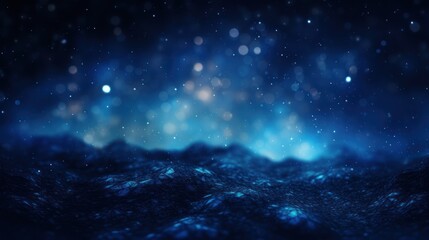 Abstract background of dark blue particles and soft blurred glow.