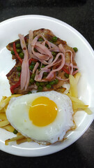 RIOJA-STYLE BEEF WITH FRIED EGGS AND BACON