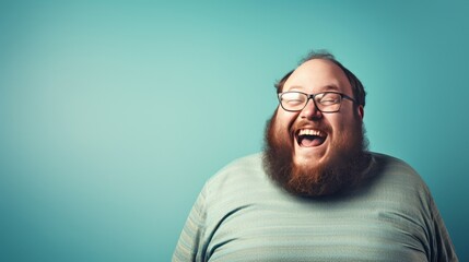 laughing fat obese man in blue shirt. - obrazy, fototapety, plakaty