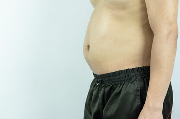 Naklejka premium Men with pot bellies or belly fat. Close-up of body parts