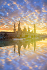 spain zaragoza city architecture and landscapes colorful sunset clouds and light - obrazy, fototapety, plakaty