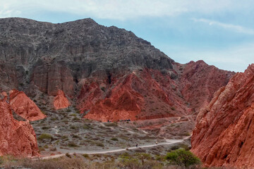 Hill of seven colors, Purmamarca, Argentina, mountain range with colorful purple and orange colors.