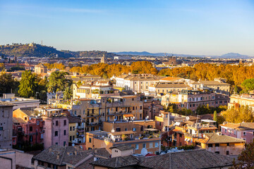 Gorgeous aerial view of the city center in Rome at sunny sunset - obrazy, fototapety, plakaty
