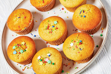 sweet lemon muffins on a plate, top view