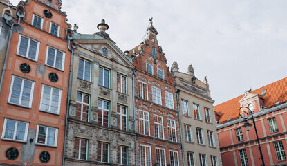 Fototapeta premium Old historical colorful building architecture facade of Old Town in Gdansk. Traveling Europe in summer. Vacation concept