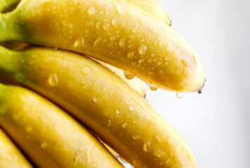 Water drops on a banana peel. Delicious ripe bananas.