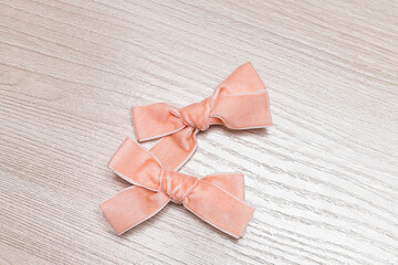Beautiful bow in beautiful soft pink color made out of tulle fabric and beads or pearls, so classy and fashionable. A great hair accessory for girls and women