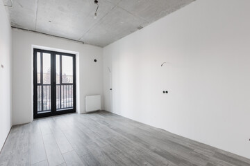 interior of the apartment without decoration in gray colors. rough finish