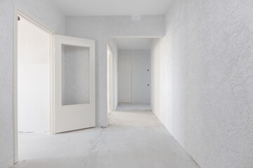 interior of the apartment without decoration in gray colors. rough finish