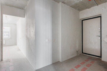 interior of the apartment without decoration in gray colors. rough finish
