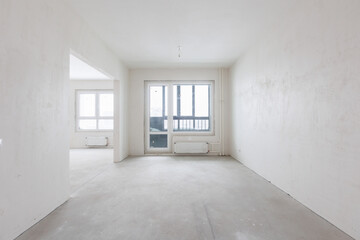 interior of the apartment without decoration in gray colors. rough finish