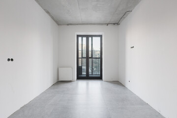 interior of the apartment without decoration in gray colors. rough finish