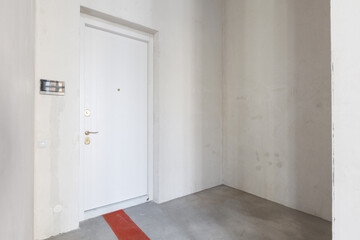 interior of the apartment without decoration in gray colors. rough finish