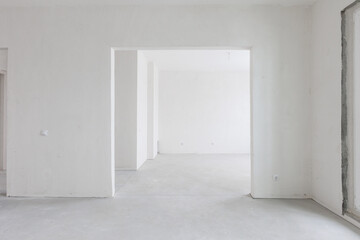 interior of the apartment without decoration in gray colors. rough finish