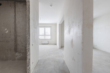 interior of the apartment without decoration in gray colors. rough finish