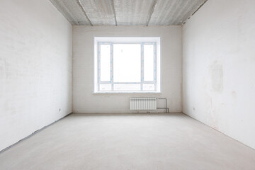 interior of the apartment without decoration in gray colors. rough finish