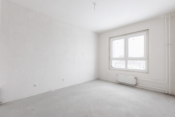 interior of the apartment without decoration in gray colors. rough finish
