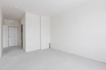 interior of the apartment without decoration in gray colors. rough finish