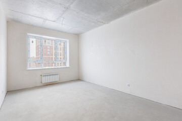 interior of the apartment without decoration in gray colors. rough finish