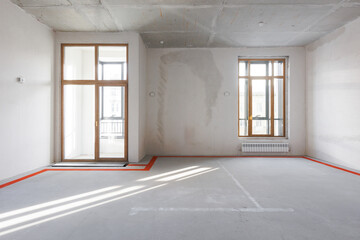 interior of the apartment without decoration in gray colors. rough finish