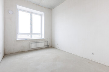 interior of the apartment without decoration in gray colors. rough finish