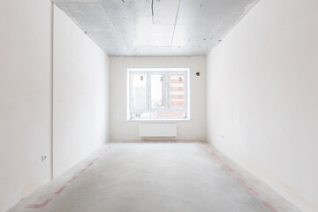 interior of the apartment without decoration in gray colors. rough finish