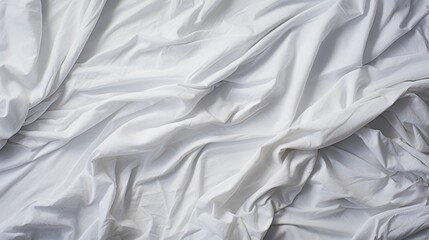 Freshly laundered bed sheets, folded neatly with visible creases.