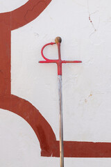 Sword of bullfighter leaning on wall