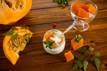 Homemade yogurt with pieces of pumpkin marmalade.
