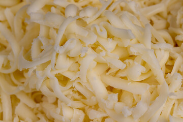 grated cheese in large quantities at home