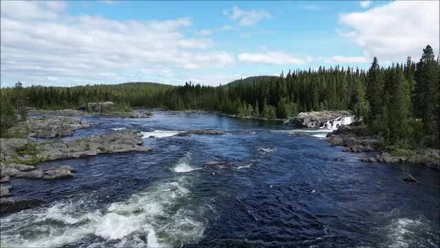 wonderful rapids Litsj&ouml;forsen in Sweden filmed with drone in summer