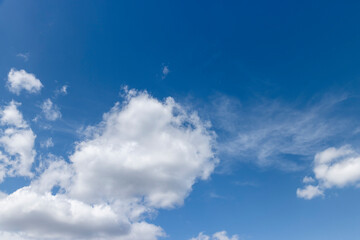 Naklejka na ściany i meble beautiful massive cumulus clouds in the sky