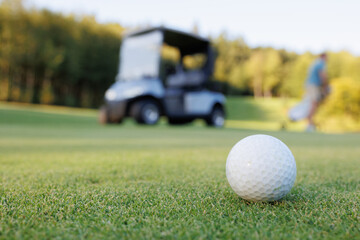 Serene Golfing Scene: Ball and Cart