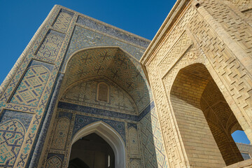 Fototapeta na wymiar Views of the Kaylan Mosque in the center of Bukhara in Uzbekistan.