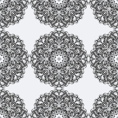 Elegant vintage seamless pattern with scrolls and curls. For print, textile